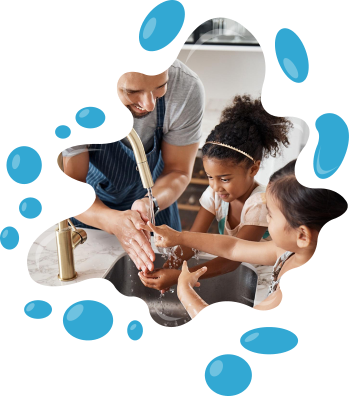 Smiling family pouring and drinking filtered well water, highlighting safe and healthy hydration through Water Pure Texas systems