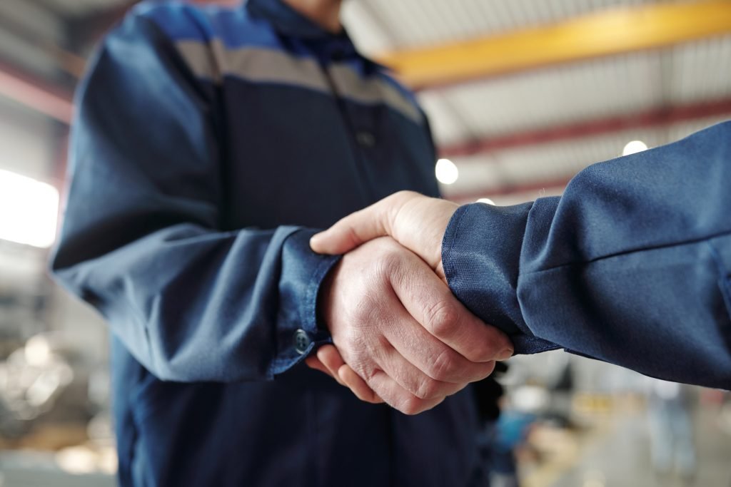 Technician shaking hands with homeowner before performing on-site water test