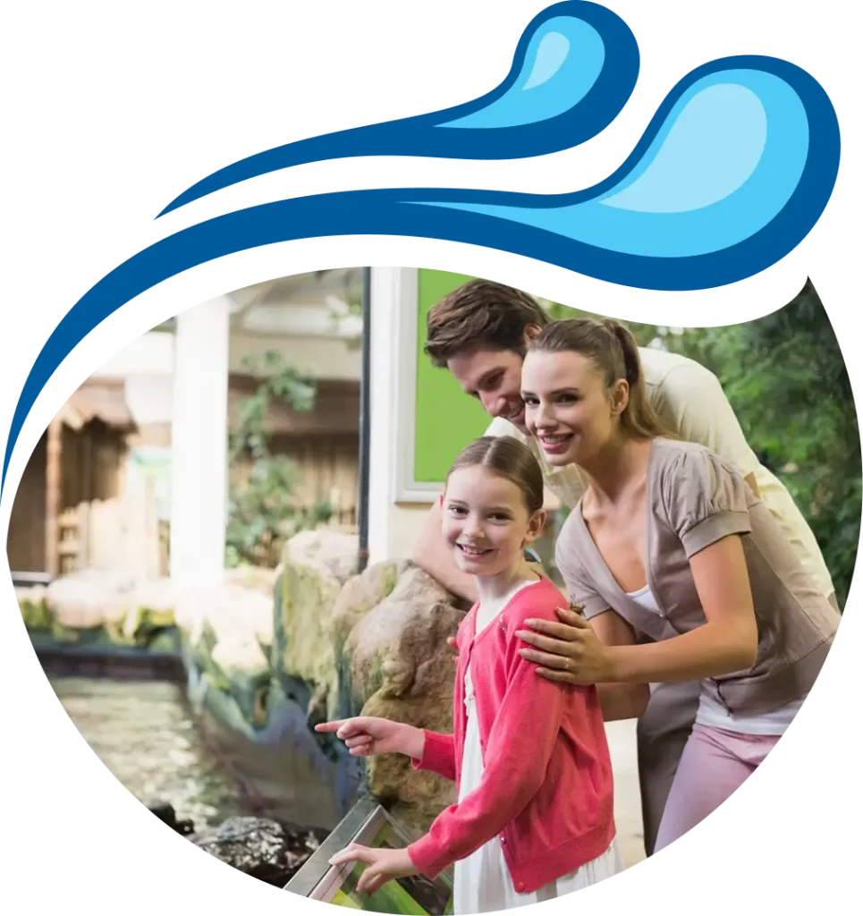 Mother and daughter happily pouring clean water from a pitcher, showing everyday hydration through holistic filtration